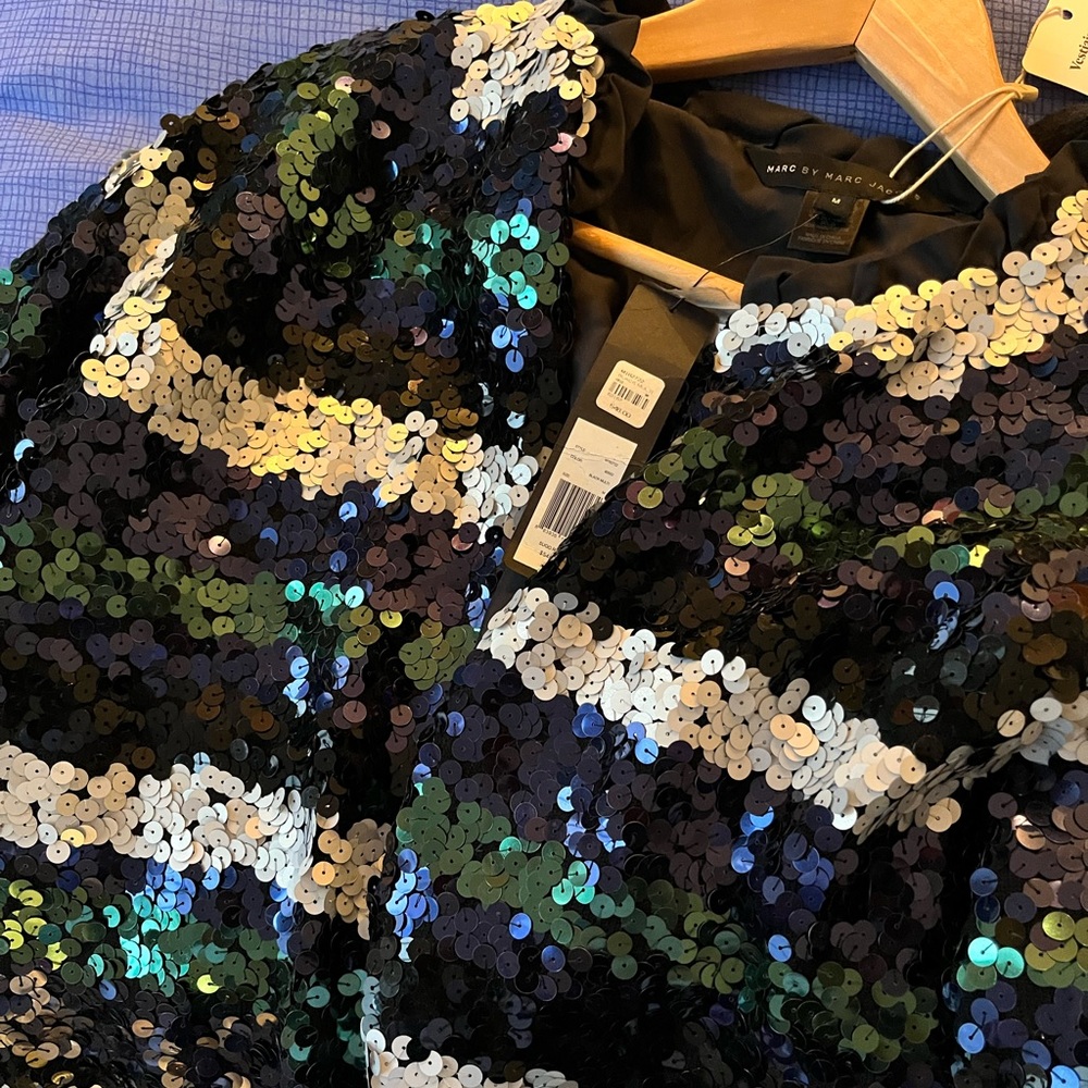 New with tags, never worn sequin jacket.